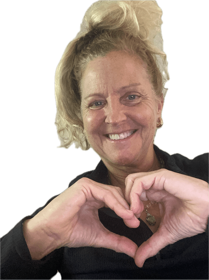 Rita Lorraine Carey making a heart shape with her hands