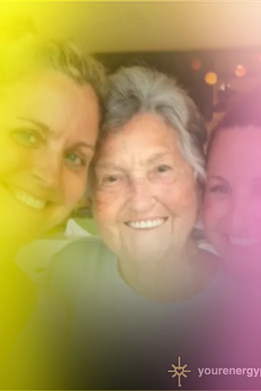 The same photograph as a YourEnergyPhoto reading, glowing in yellow, pink and gold